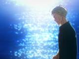 Nanami Kento in profile, eyes closed, in front of a sea full of light