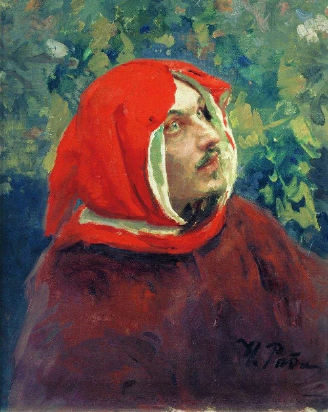 Dante in a red hood and robe, looking upward, against dark green foliage